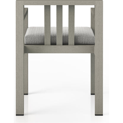 Monterey Outdoor Dining Armchair, Weathered Grey by Four Hands in weathered grey. Made from 100% olefin, solid fsc®-certified teak, 91% polyurethane foam pad, 9% polyester fiber batting in a modern style.