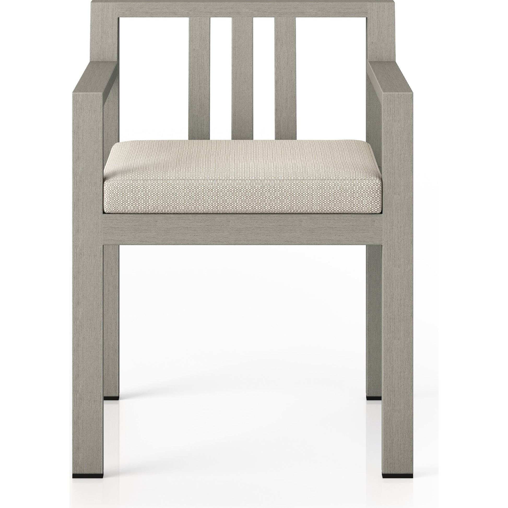 Monterey Outdoor Dining Armchair, Weathered Grey by Four Hands in weathered grey. Made from 100% olefin, solid fsc®-certified teak, 91% polyurethane foam pad, 9% polyester fiber batting in a modern style.