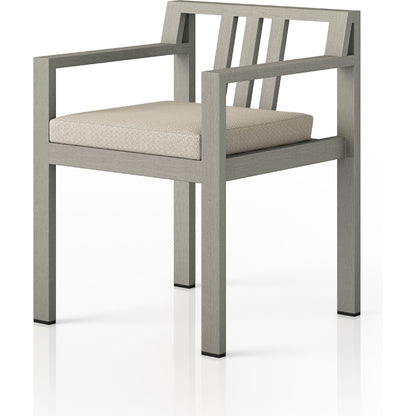 Monterey Outdoor Dining Armchair, Weathered Grey by Four Hands in weathered grey. Made from 100% olefin, solid fsc®-certified teak, 91% polyurethane foam pad, 9% polyester fiber batting in a modern style.