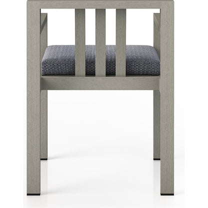Monterey Outdoor Dining Armchair, Weathered Grey by Four Hands in weathered grey. Made from 100% olefin, solid fsc®-certified teak, 91% polyurethane foam pad, 9% polyester fiber batting in a modern style.