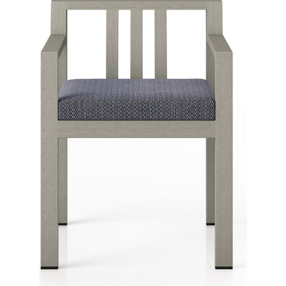 Monterey Outdoor Dining Armchair, Weathered Grey by Four Hands in weathered grey. Made from 100% olefin, solid fsc®-certified teak, 91% polyurethane foam pad, 9% polyester fiber batting in a modern style.