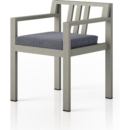 Monterey Outdoor Dining Armchair, Weathered Grey by Four Hands in weathered grey. Made from 100% olefin, solid fsc®-certified teak, 91% polyurethane foam pad, 9% polyester fiber batting in a modern style.
