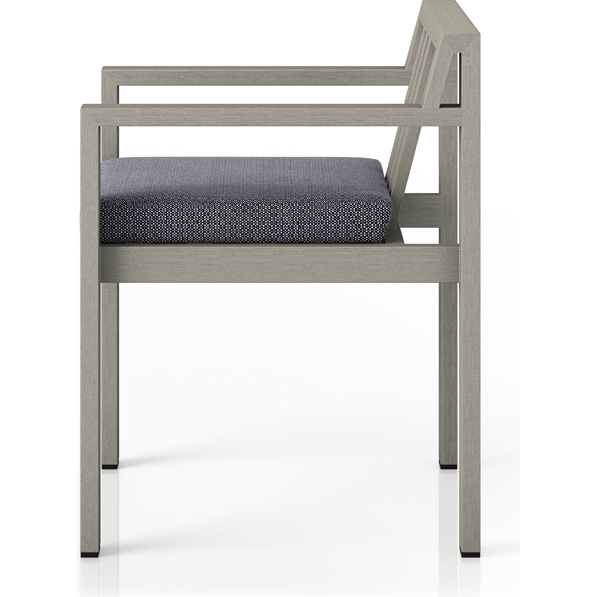 Monterey Outdoor Dining Armchair, Weathered Grey by Four Hands in weathered grey. Made from 100% olefin, solid fsc®-certified teak, 91% polyurethane foam pad, 9% polyester fiber batting in a modern style.