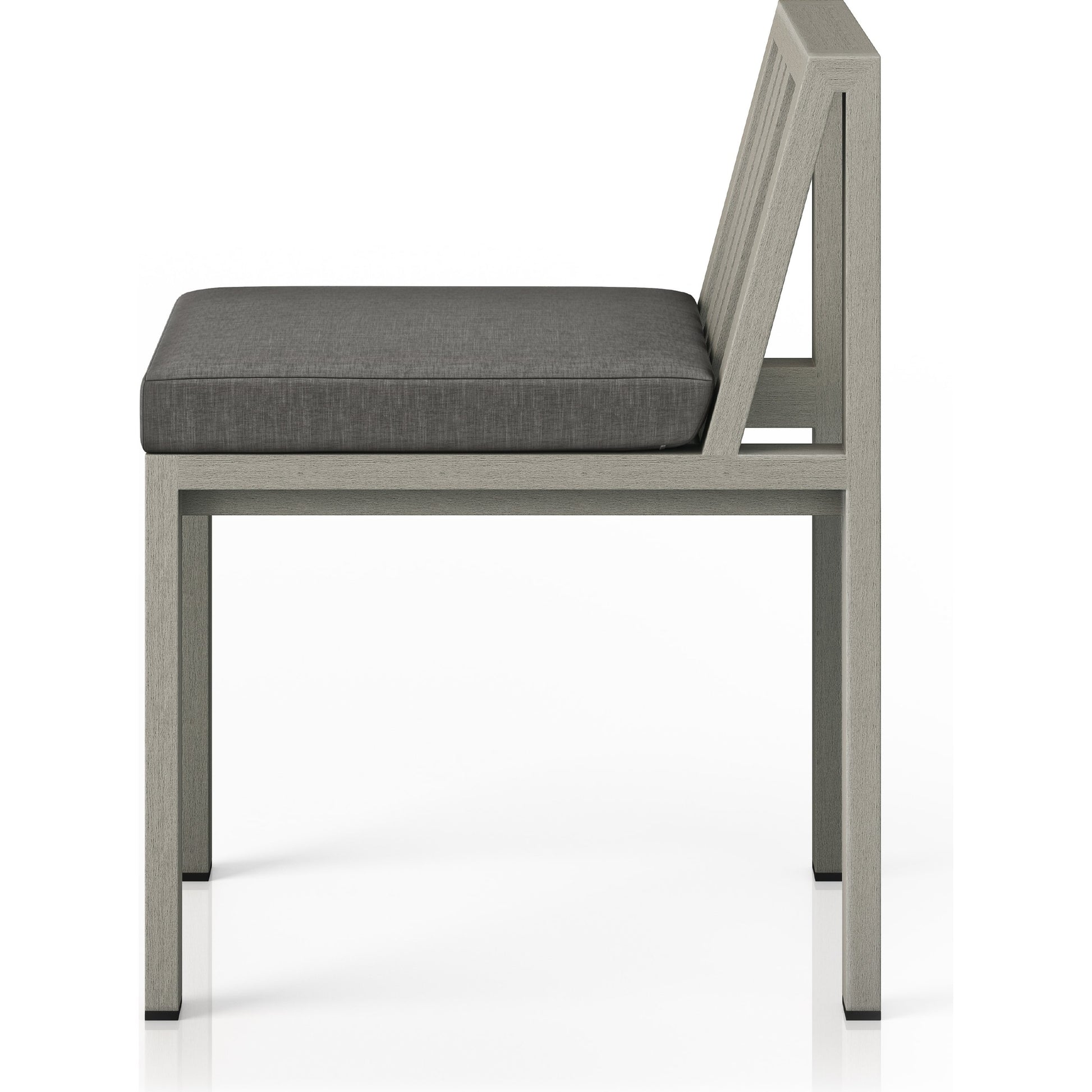 Monterey Outdoor Dining Chair by Four Hands in washed brown. Made from 100% olefin, solid fsc®-certified teak, 91% polyurethane foam pad, 9% polyester fiber batting in a modern style.