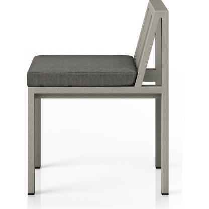 Monterey Outdoor Dining Chair by Four Hands in washed brown. Made from 100% olefin, solid fsc®-certified teak, 91% polyurethane foam pad, 9% polyester fiber batting in a modern style.