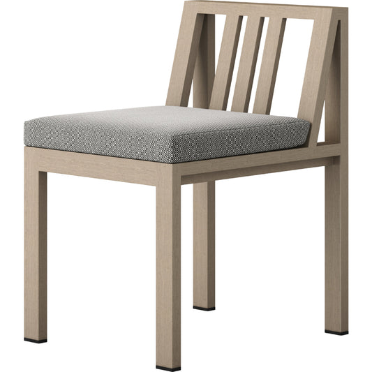 Monterey Outdoor Dining Chair by Four Hands in washed brown. Made from 100% olefin, solid fsc®-certified teak, 91% polyurethane foam pad, 9% polyester fiber batting in a modern style.