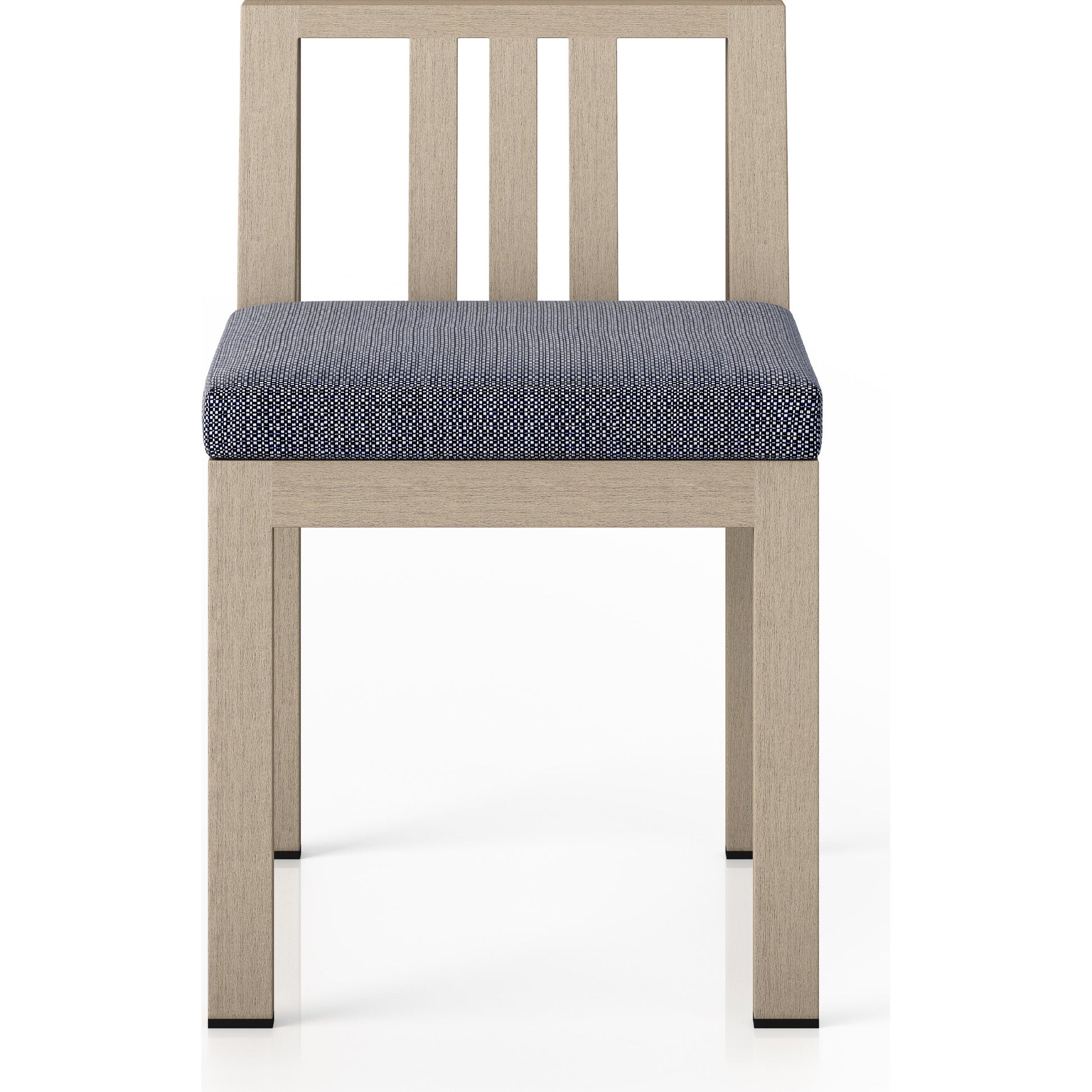 Monterey Outdoor Dining Chair by Four Hands in washed brown. Made from 100% olefin, solid fsc®-certified teak, 91% polyurethane foam pad, 9% polyester fiber batting in a modern style.