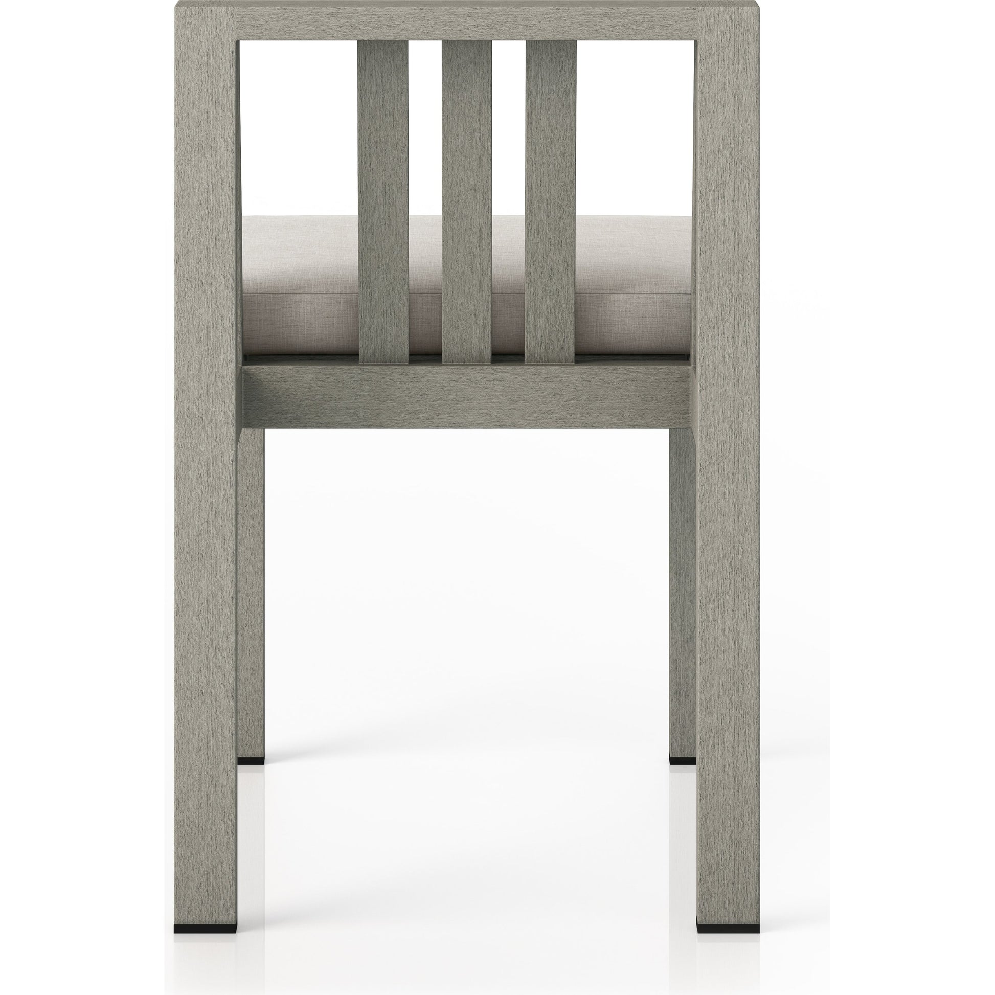 Monterey Outdoor Dining Chair by Four Hands in washed brown. Made from 100% olefin, solid fsc®-certified teak, 91% polyurethane foam pad, 9% polyester fiber batting in a modern style.