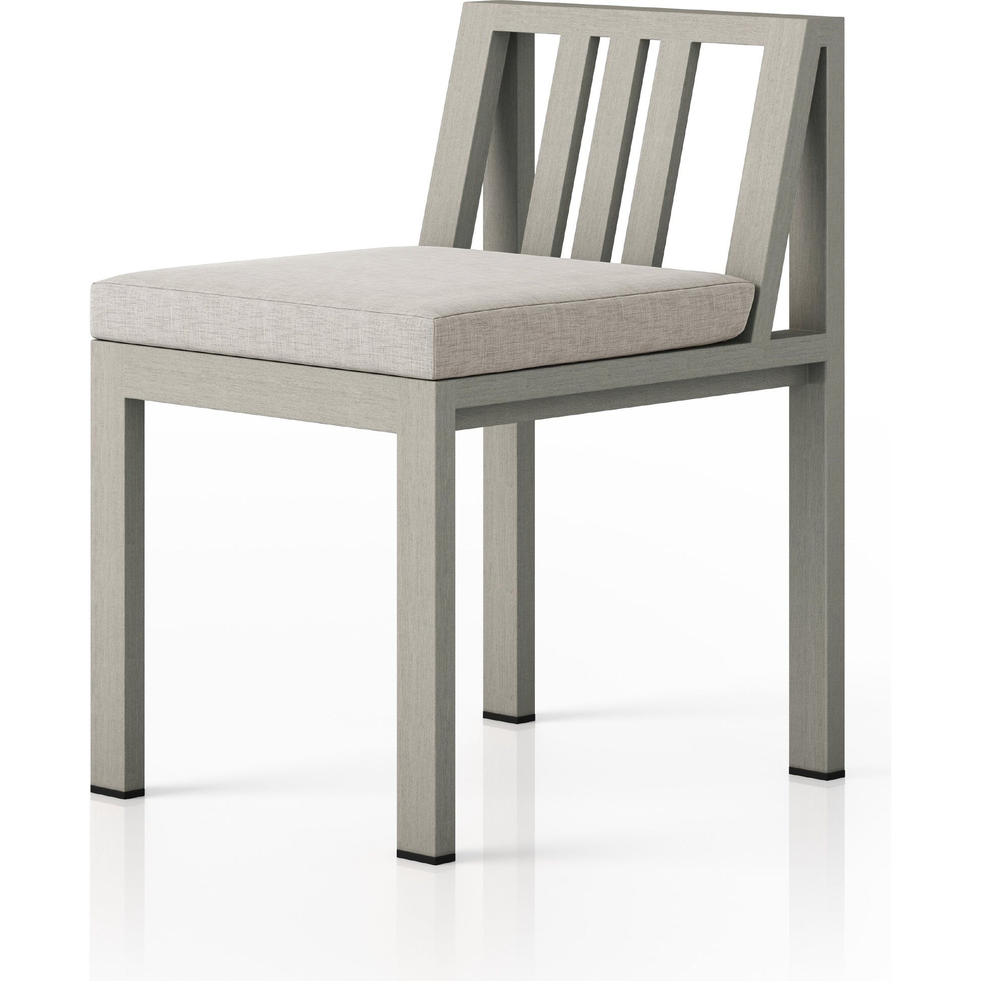 Monterey Outdoor Dining Chair by Four Hands in washed brown. Made from 100% olefin, solid fsc®-certified teak, 91% polyurethane foam pad, 9% polyester fiber batting in a modern style.