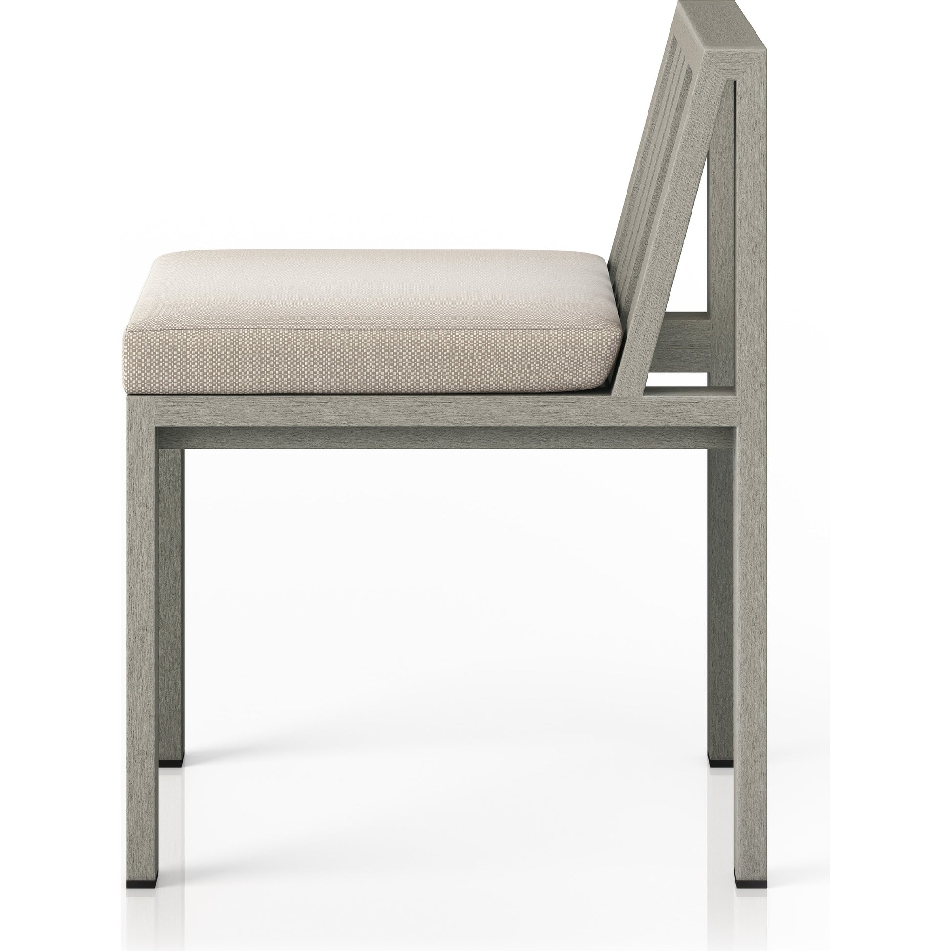 Monterey Outdoor Dining Chair by Four Hands in washed brown. Made from 100% olefin, solid fsc®-certified teak, 91% polyurethane foam pad, 9% polyester fiber batting in a modern style.