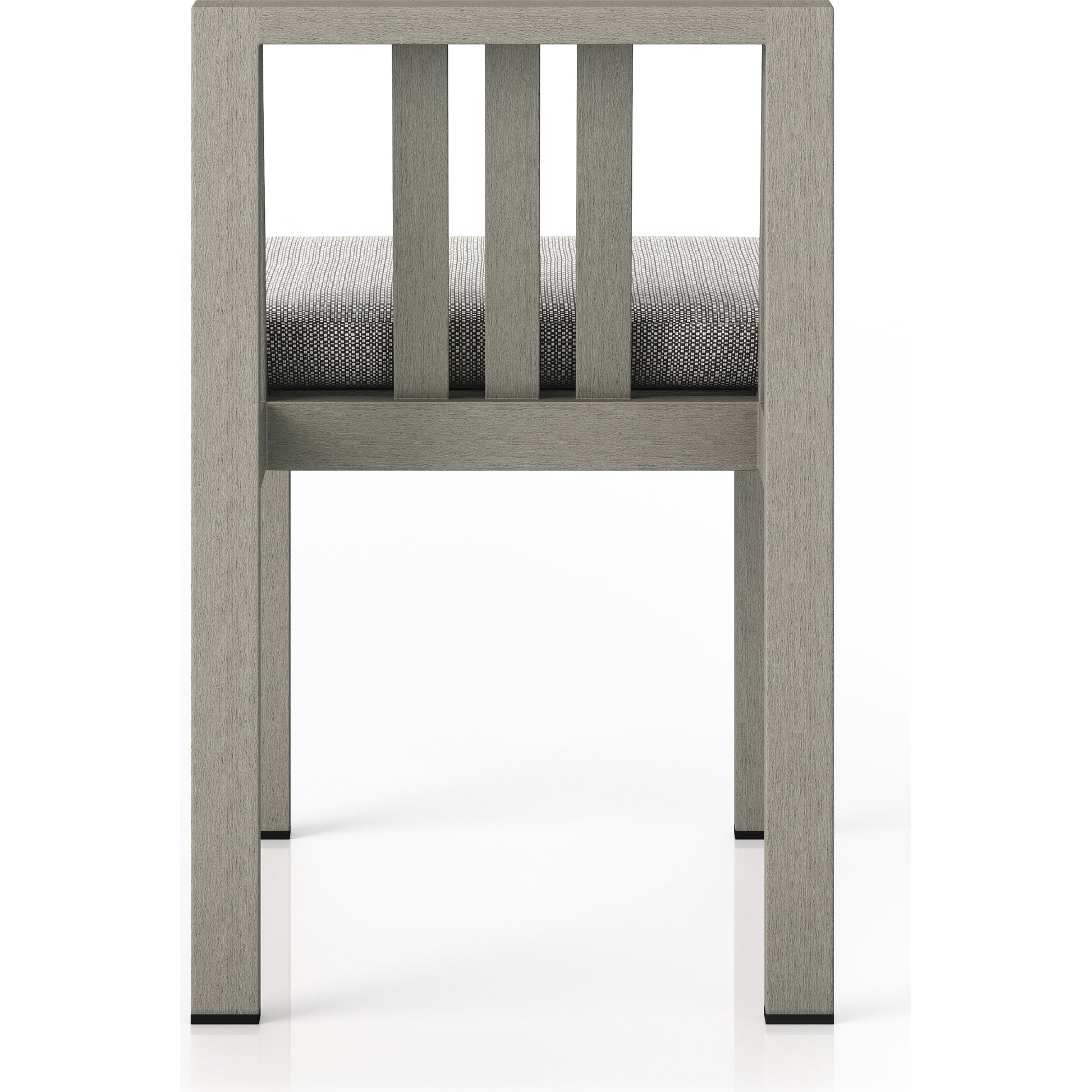 Monterey Outdoor Dining Chair by Four Hands in washed brown. Made from 100% olefin, solid fsc®-certified teak, 91% polyurethane foam pad, 9% polyester fiber batting in a modern style.