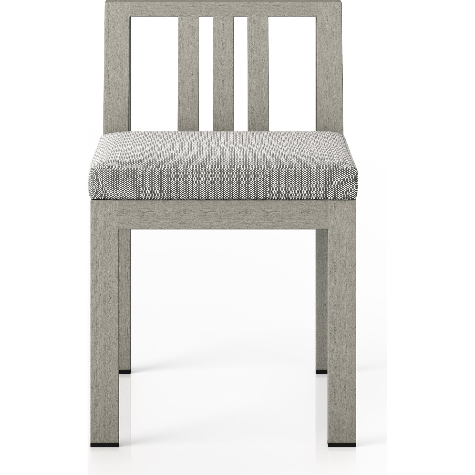 Monterey Outdoor Dining Chair by Four Hands in washed brown. Made from 100% olefin, solid fsc®-certified teak, 91% polyurethane foam pad, 9% polyester fiber batting in a modern style.