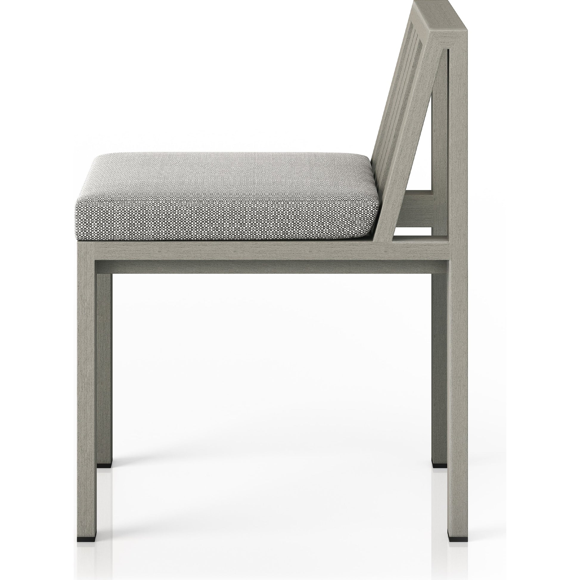 Monterey Outdoor Dining Chair by Four Hands in washed brown. Made from 100% olefin, solid fsc®-certified teak, 91% polyurethane foam pad, 9% polyester fiber batting in a modern style.