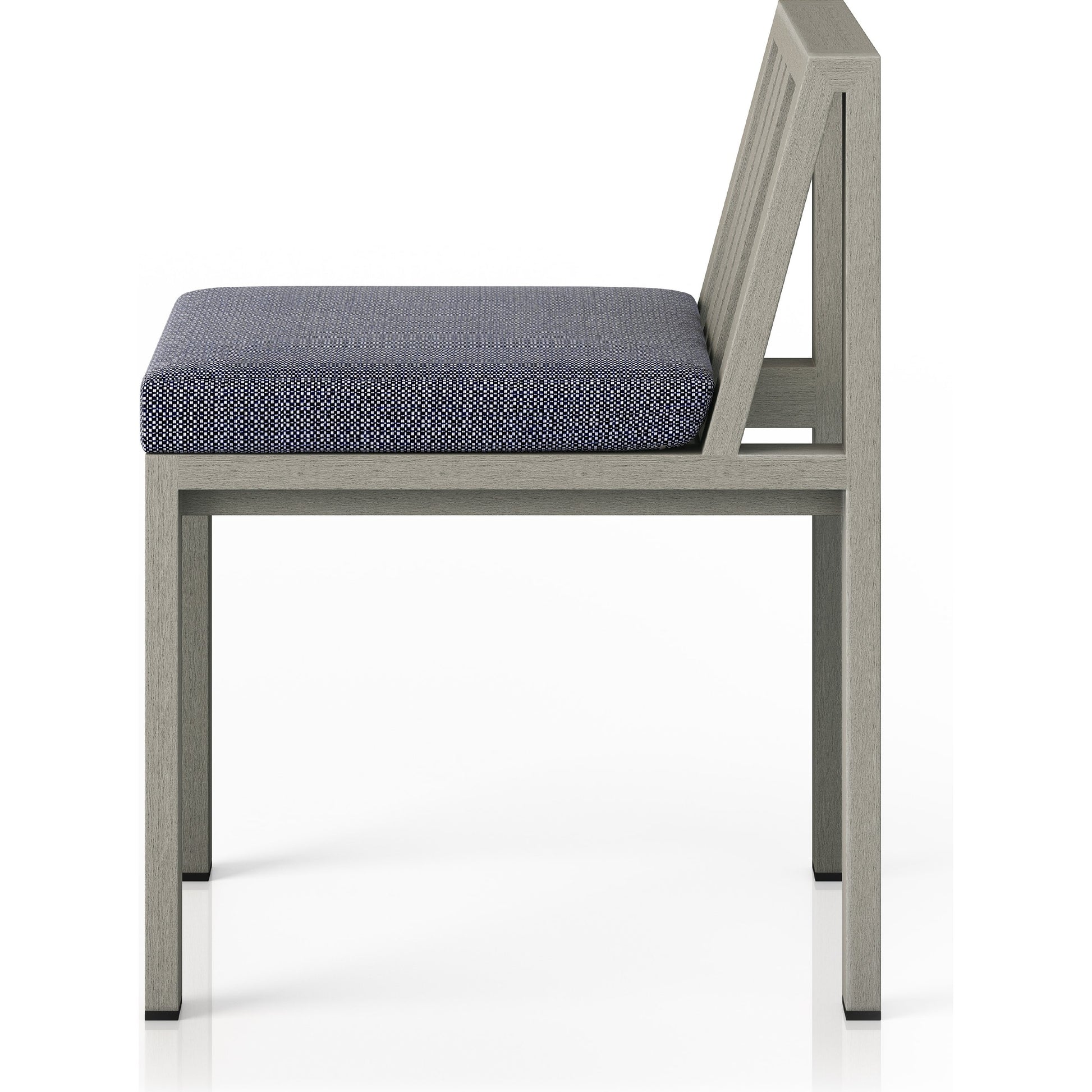 Monterey Outdoor Dining Chair by Four Hands in washed brown. Made from 100% olefin, solid fsc®-certified teak, 91% polyurethane foam pad, 9% polyester fiber batting in a modern style.