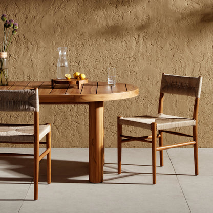 Lomas Outdoor Dining Chair by Four Hands. Made from solid teak, 100% polyethylene in a cottage & farmhouse style.
