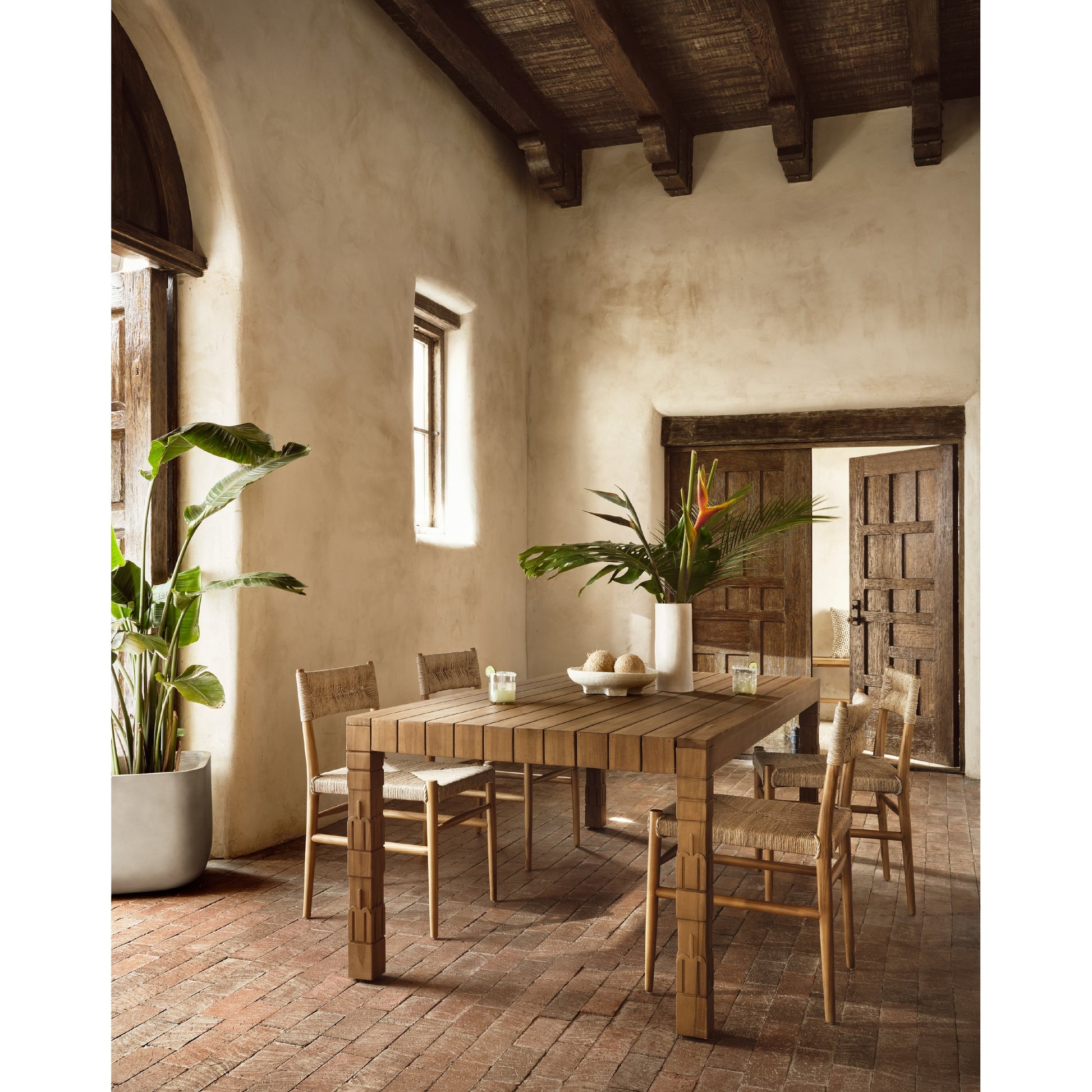 Lomas Outdoor Dining Chair by Four Hands. Made from solid teak, 100% polyethylene in a cottage & farmhouse style.