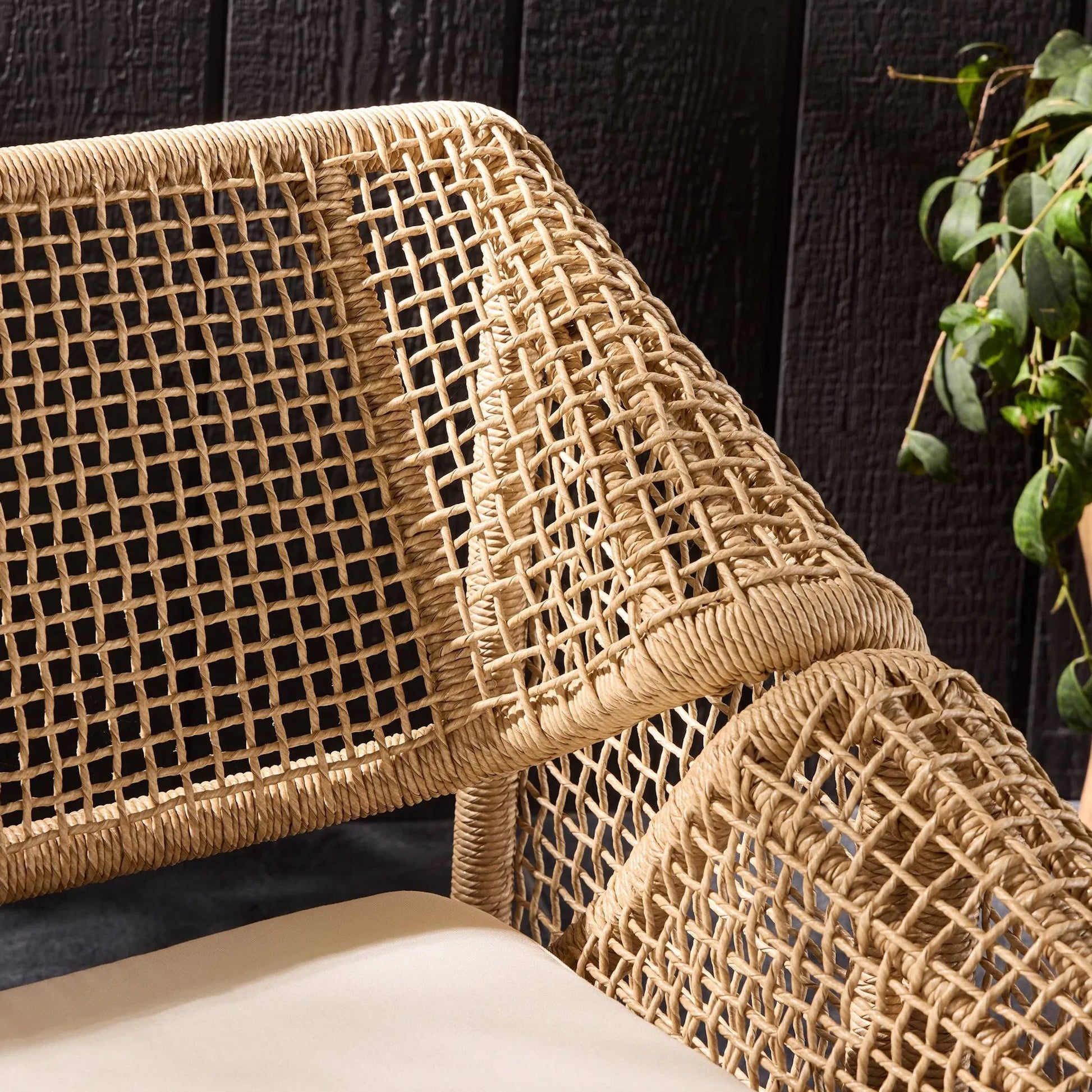 Selma Outdoor Chair by Four Hands. Made from 100% olefin, 100% polyethylene, 91% polyurethane foam pad, 9% polyester fiber batting in a coastal style.