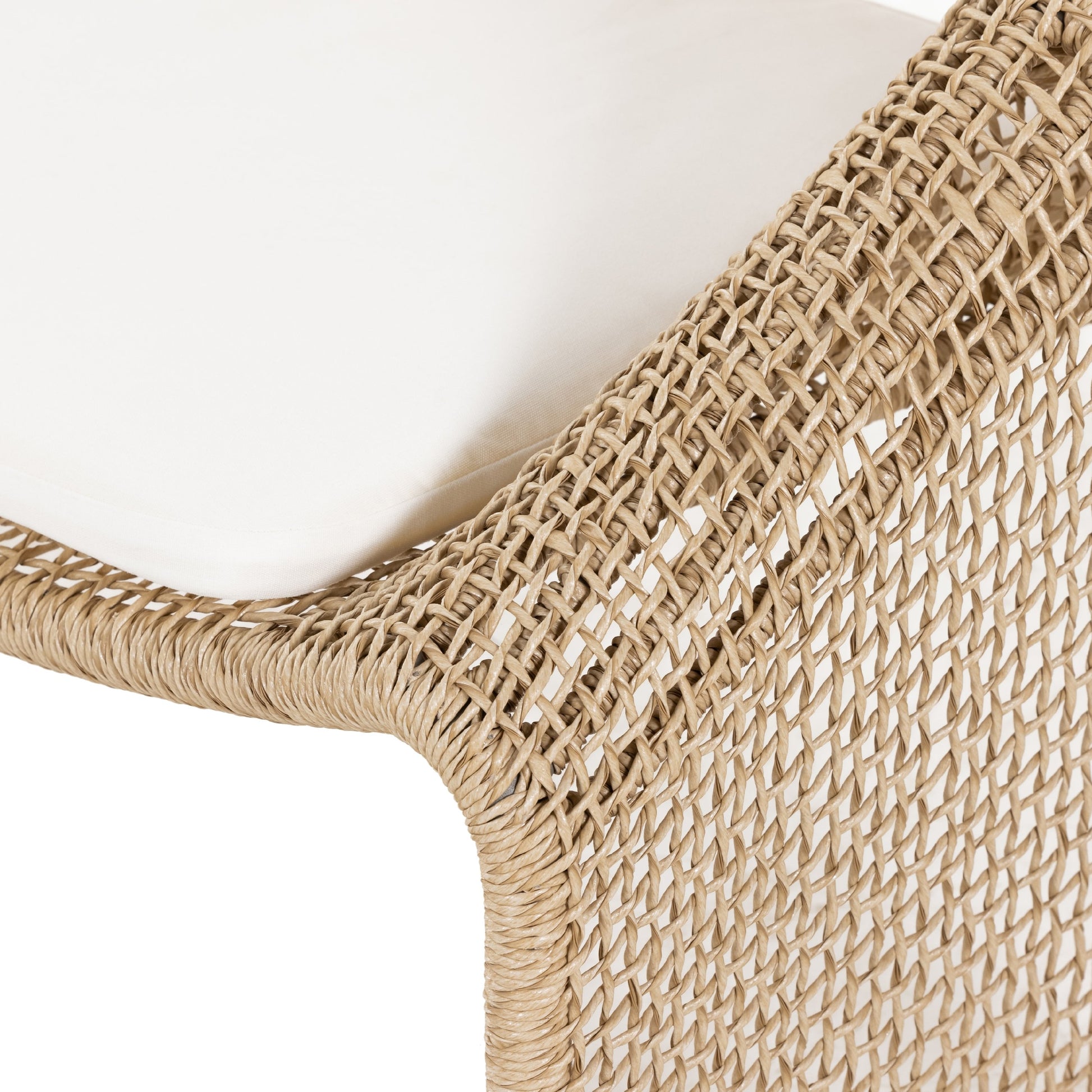 Selma Outdoor Chair by Four Hands. Made from 100% olefin, 100% polyethylene, 91% polyurethane foam pad, 9% polyester fiber batting in a coastal style.