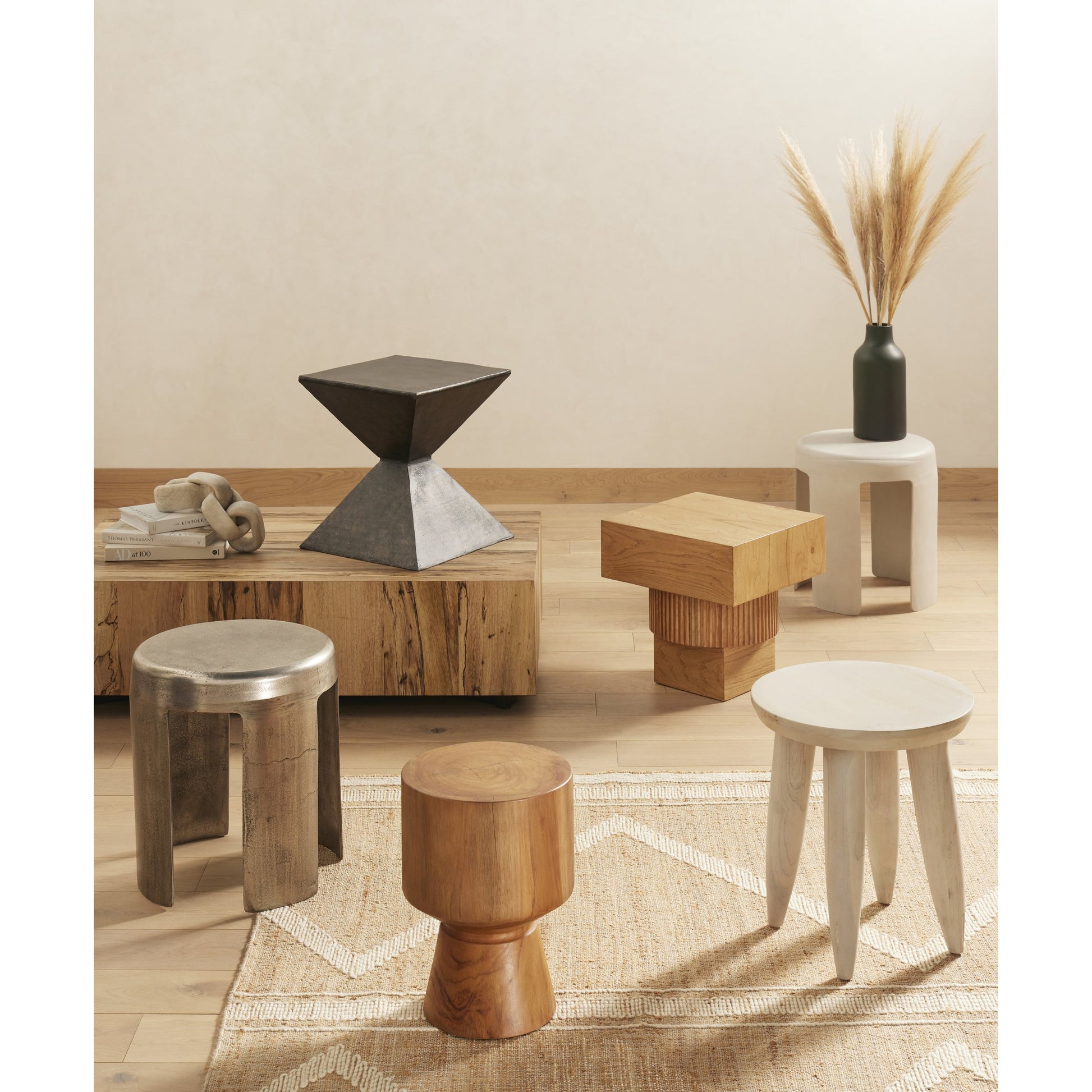 Jovie Outdoor End Table by Four Hands. Made from solid teak in a modern style.