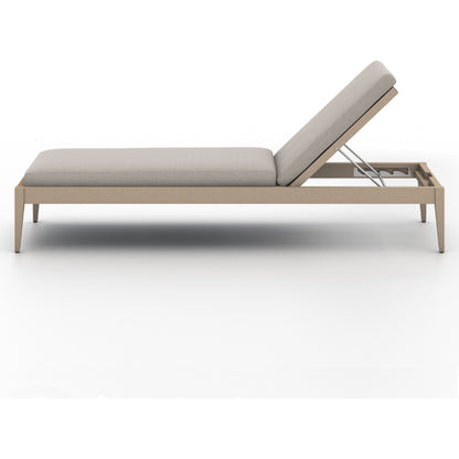 Sherwood Outdoor Chaise by Four Hands. Made from 100% olefin, solid fsc®-certified teak, 100% polypropylene in a coastal style.