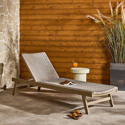 Delano Outdoor Chaise by Four Hands. Made from solid fsc®-certified teak, 100% polypropylene, stainless steel in a coastal style.