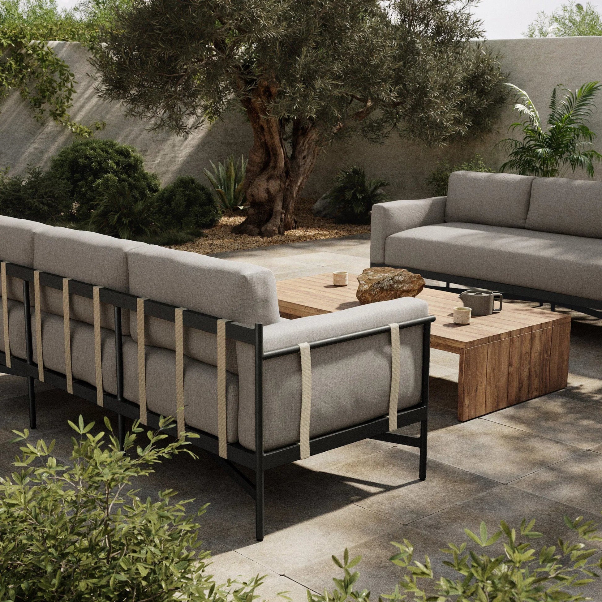Hearst 99" Outdoor Sofa by Four Hands in bronze. Made from 100% olefin, aluminum, 100% polypropylene in a modern style.