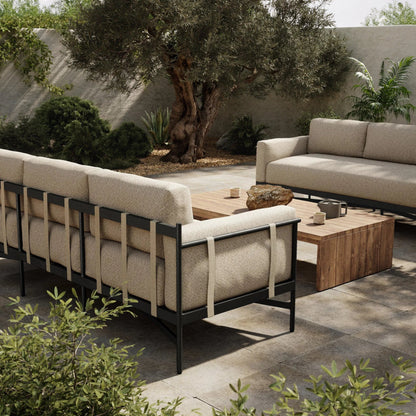 Hearst 99" Outdoor Sofa by Four Hands in bronze. Made from 100% olefin, aluminum, 100% polypropylene in a modern style.