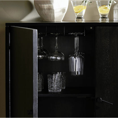 Reza Bar Cabinet by Four Hands in smoked honey parawood. Made from solid parawood, brass, solid acacia in a transitional style.