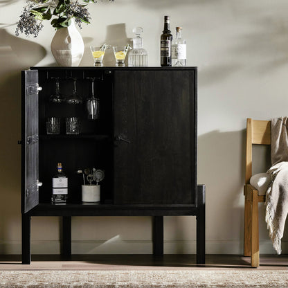 Reza Bar Cabinet by Four Hands in smoked honey parawood. Made from solid parawood, brass, solid acacia in a transitional style.