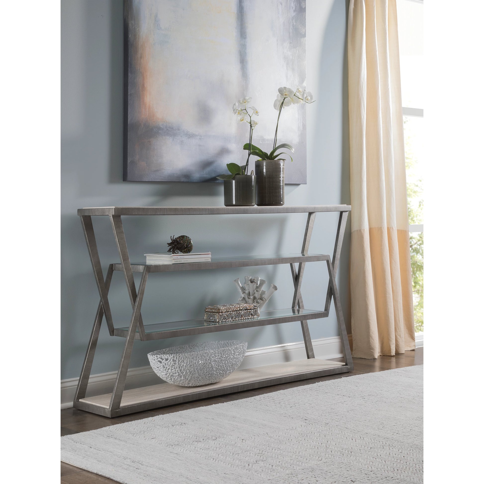 Adamo Console by Artistica Home in silver leaf. Made from unique in a modern style.