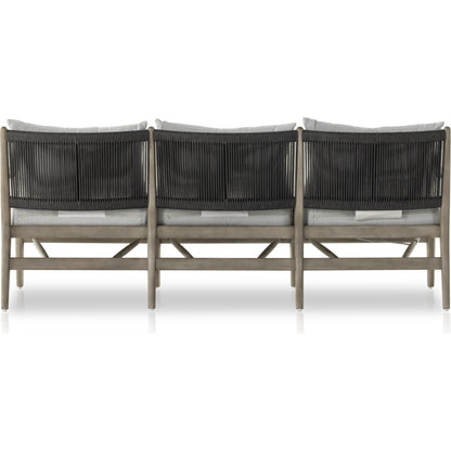 Rosen Outdoor Sofa by Four Hands in lakin oat, natural eucalyptus fsc, natural rope. Made from 100% olefin, solid fsc®-certified eucalyptus, 98% polypropylene, 2% polyester in a coastal style.