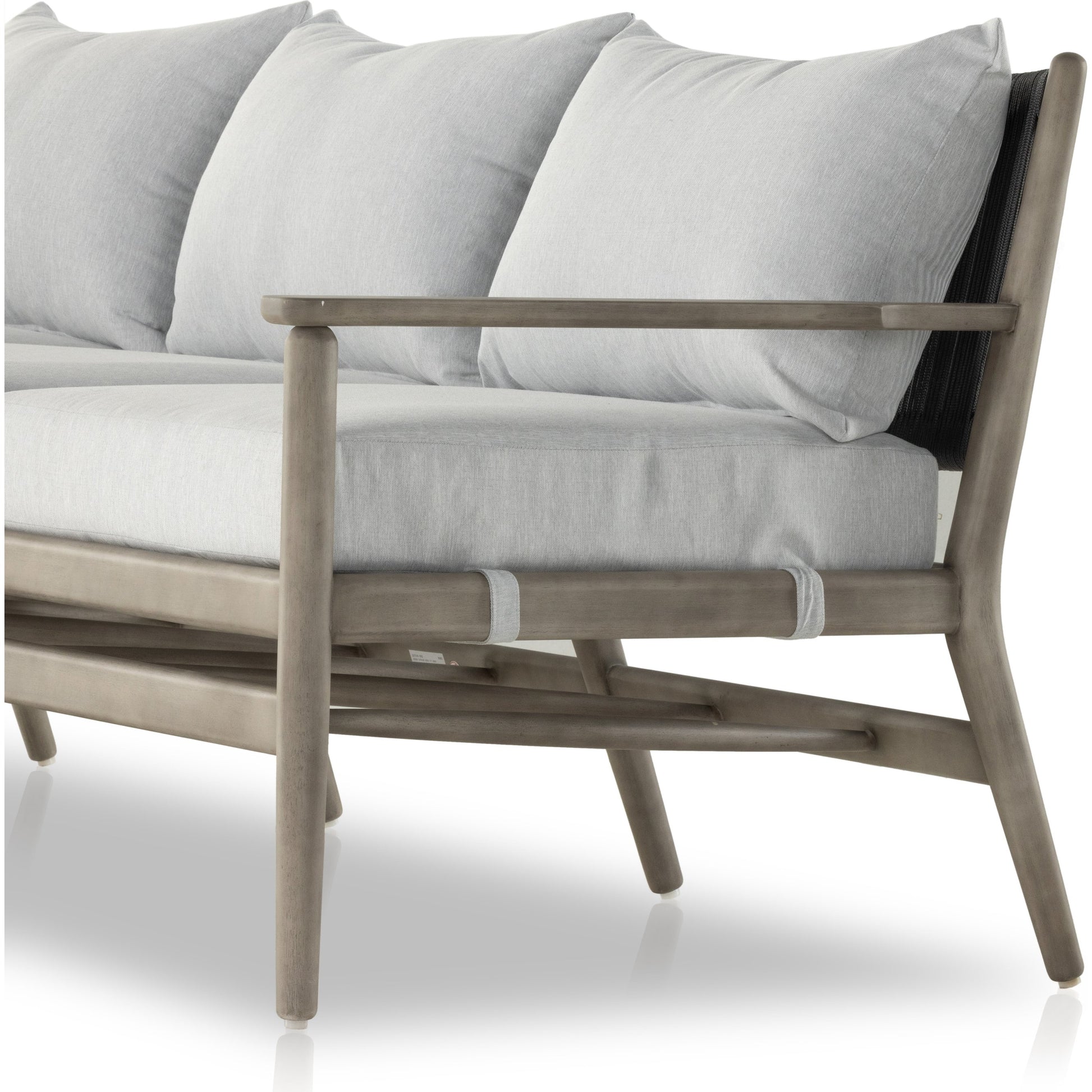 Rosen Outdoor Sofa by Four Hands in lakin oat, natural eucalyptus fsc, natural rope. Made from 100% olefin, solid fsc®-certified eucalyptus, 98% polypropylene, 2% polyester in a coastal style.