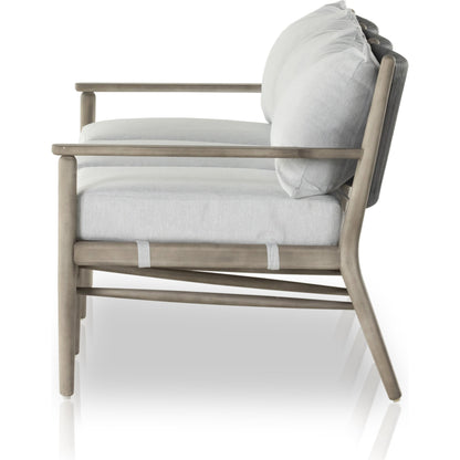 Rosen Outdoor Sofa by Four Hands in lakin oat, natural eucalyptus fsc, natural rope. Made from 100% olefin, solid fsc®-certified eucalyptus, 98% polypropylene, 2% polyester in a coastal style.