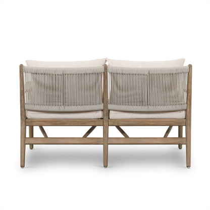 Rosen Outdoor Sofa by Four Hands in lakin oat, natural eucalyptus fsc, natural rope. Made from 100% olefin, solid fsc®-certified eucalyptus, 98% polypropylene, 2% polyester in a coastal style.
