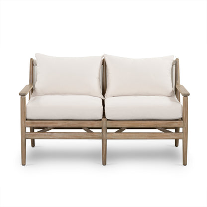 Rosen Outdoor Sofa by Four Hands in lakin oat, natural eucalyptus fsc, natural rope. Made from 100% olefin, solid fsc®-certified eucalyptus, 98% polypropylene, 2% polyester in a coastal style.