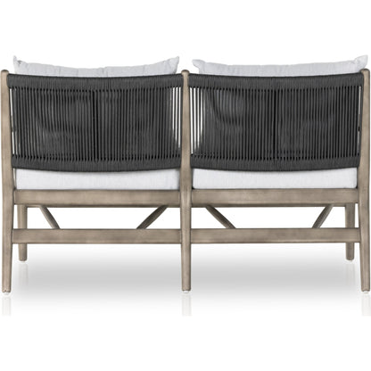 Rosen Outdoor Sofa by Four Hands in lakin oat, natural eucalyptus fsc, natural rope. Made from 100% olefin, solid fsc®-certified eucalyptus, 98% polypropylene, 2% polyester in a coastal style.