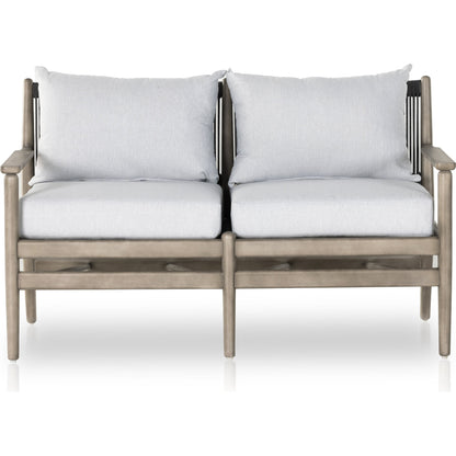 Rosen Outdoor Sofa by Four Hands in lakin oat, natural eucalyptus fsc, natural rope. Made from 100% olefin, solid fsc®-certified eucalyptus, 98% polypropylene, 2% polyester in a coastal style.