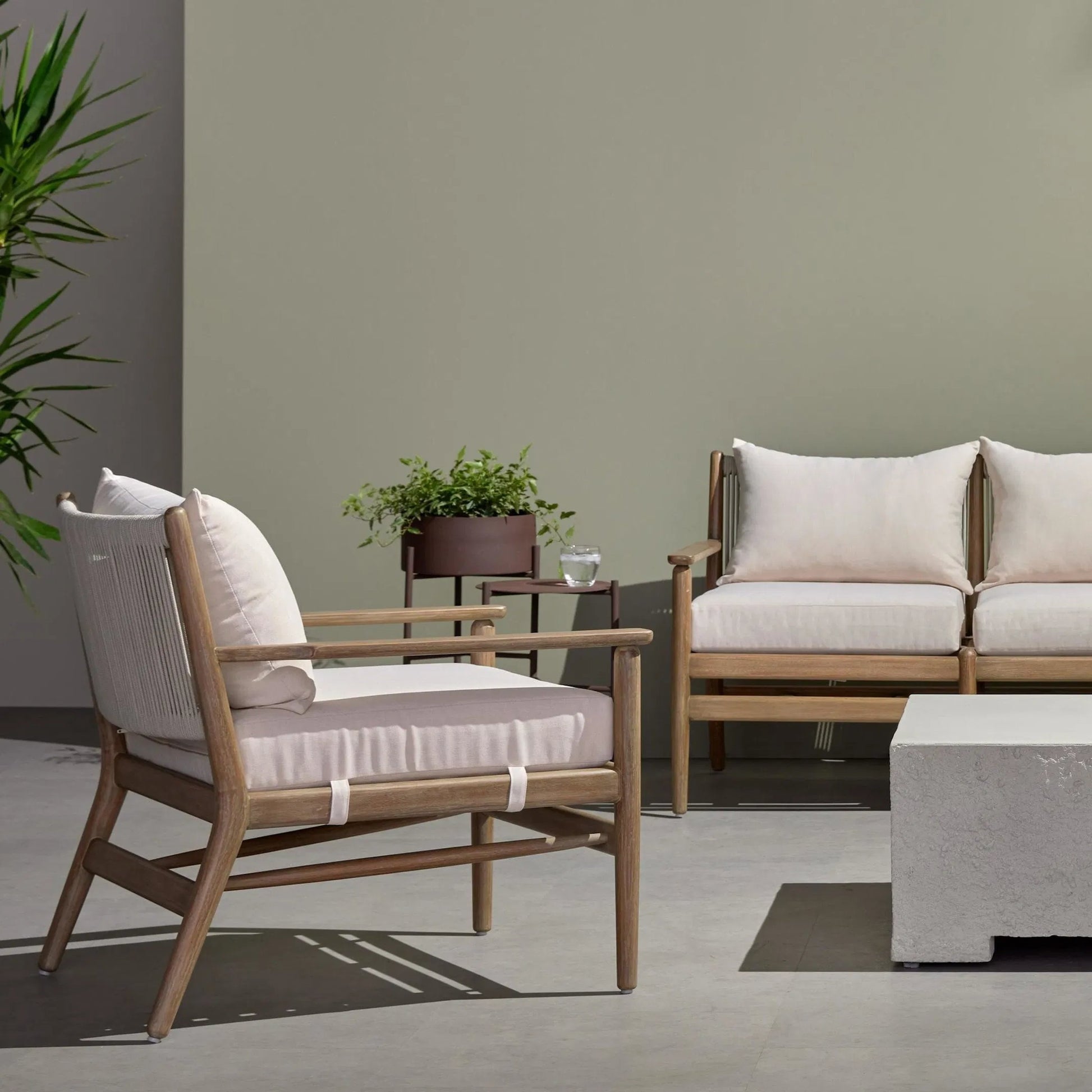 Rosen Outdoor Chair by Four Hands in lakin oat. Made from 100% olefin, solid fsc®-certified eucalyptus, 98% polypropylene, 2% polyester in a coastal style.
