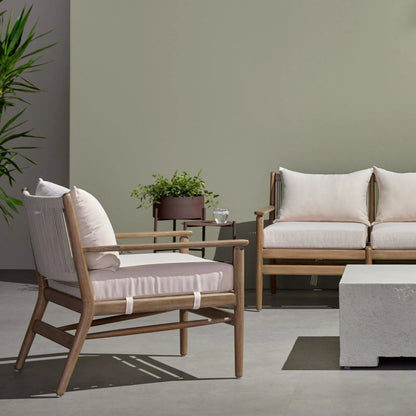 Rosen Outdoor Chair by Four Hands in lakin oat. Made from 100% olefin, solid fsc®-certified eucalyptus, 98% polypropylene, 2% polyester in a coastal style.