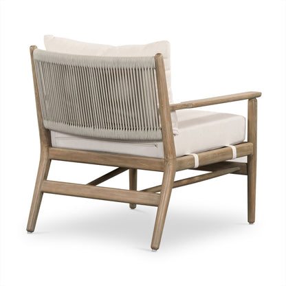 Rosen Outdoor Chair by Four Hands in lakin oat. Made from 100% olefin, solid fsc®-certified eucalyptus, 98% polypropylene, 2% polyester in a coastal style.