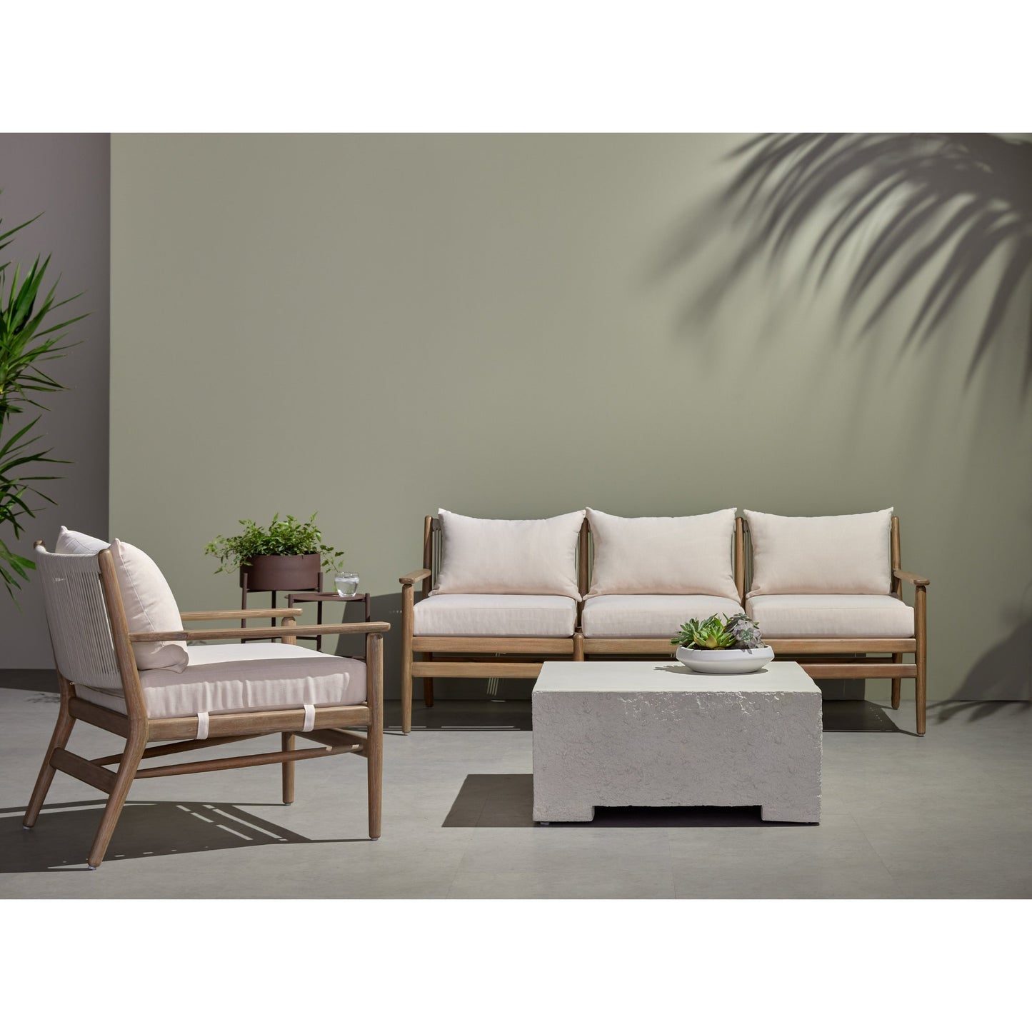 014 SI-1716558 | Lifestyle | Rosen Outdoor Chair by Four Hands in lakin oat. Made from 100% olefin, solid fsc®-certified eucalyptus, 98% polypropylene, 2% polyester in a coastal style.