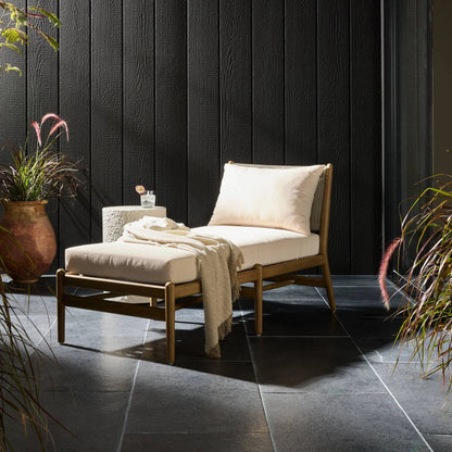 Rosen Outdoor Chaise by Four Hands in lakin oat, natural eucalyptus fsc, natural rope. Made from 100% olefin, solid fsc®-certified eucalyptus, 98% polypropylene, 2% polyester in a coastal style.