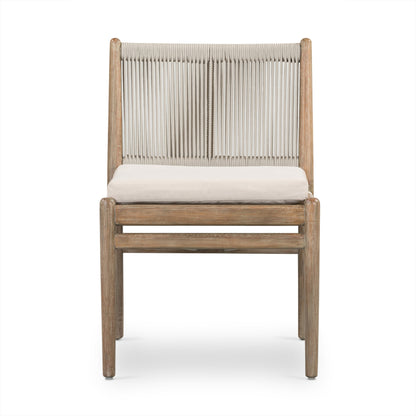 Rosen Outdoor Dining Chair by Four Hands in lakin oat. Made from 100% olefin, solid fsc®-certified eucalyptus, 98% polypropylene, 2% polyester in a coastal style.