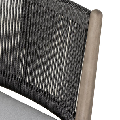 Rosen Outdoor Dining Chair by Four Hands in lakin oat. Made from 100% olefin, solid fsc®-certified eucalyptus, 98% polypropylene, 2% polyester in a coastal style.