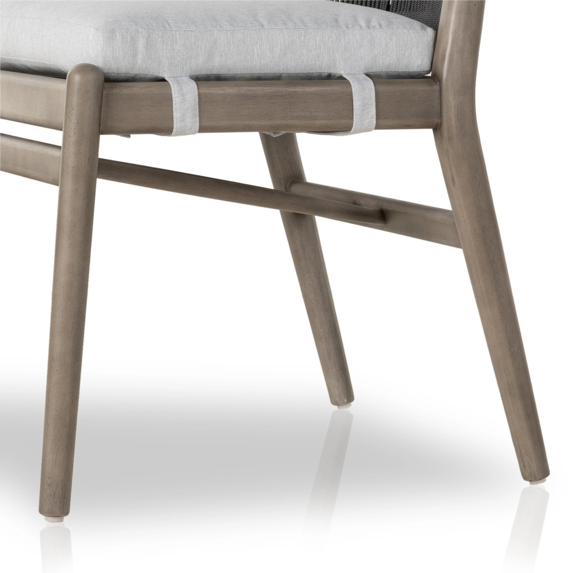 Rosen Outdoor Dining Chair by Four Hands in lakin oat. Made from 100% olefin, solid fsc®-certified eucalyptus, 98% polypropylene, 2% polyester in a coastal style.