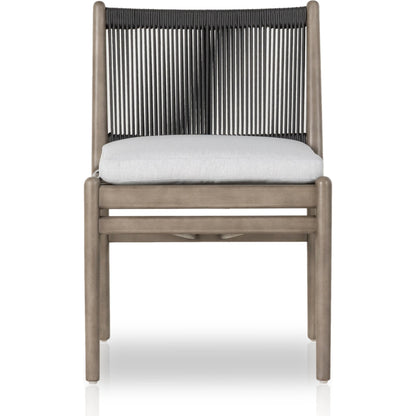 Rosen Outdoor Dining Chair by Four Hands in lakin oat. Made from 100% olefin, solid fsc®-certified eucalyptus, 98% polypropylene, 2% polyester in a coastal style.