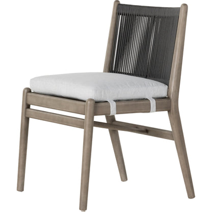 Rosen Outdoor Dining Chair by Four Hands in lakin oat. Made from 100% olefin, solid fsc®-certified eucalyptus, 98% polypropylene, 2% polyester in a coastal style.