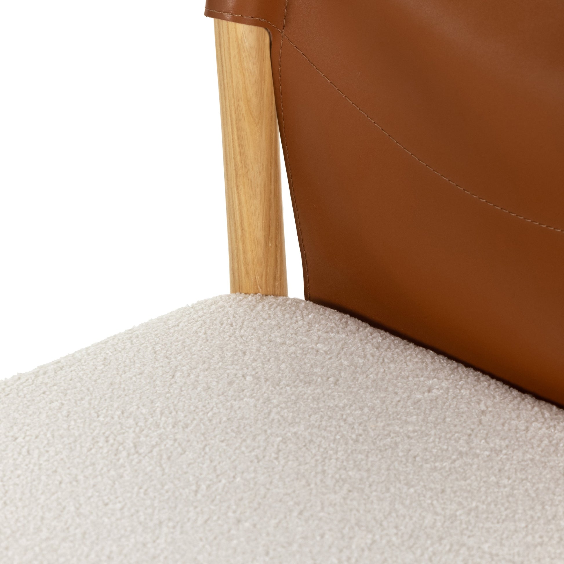 Lulu Armless Dining Chair by Four Hands in espresso leather, cardiff cream and umber ash. Made from 100% polyester, solid ash, 70% split leather, 30% polyvinyl chloride (pvc) in a modern style.