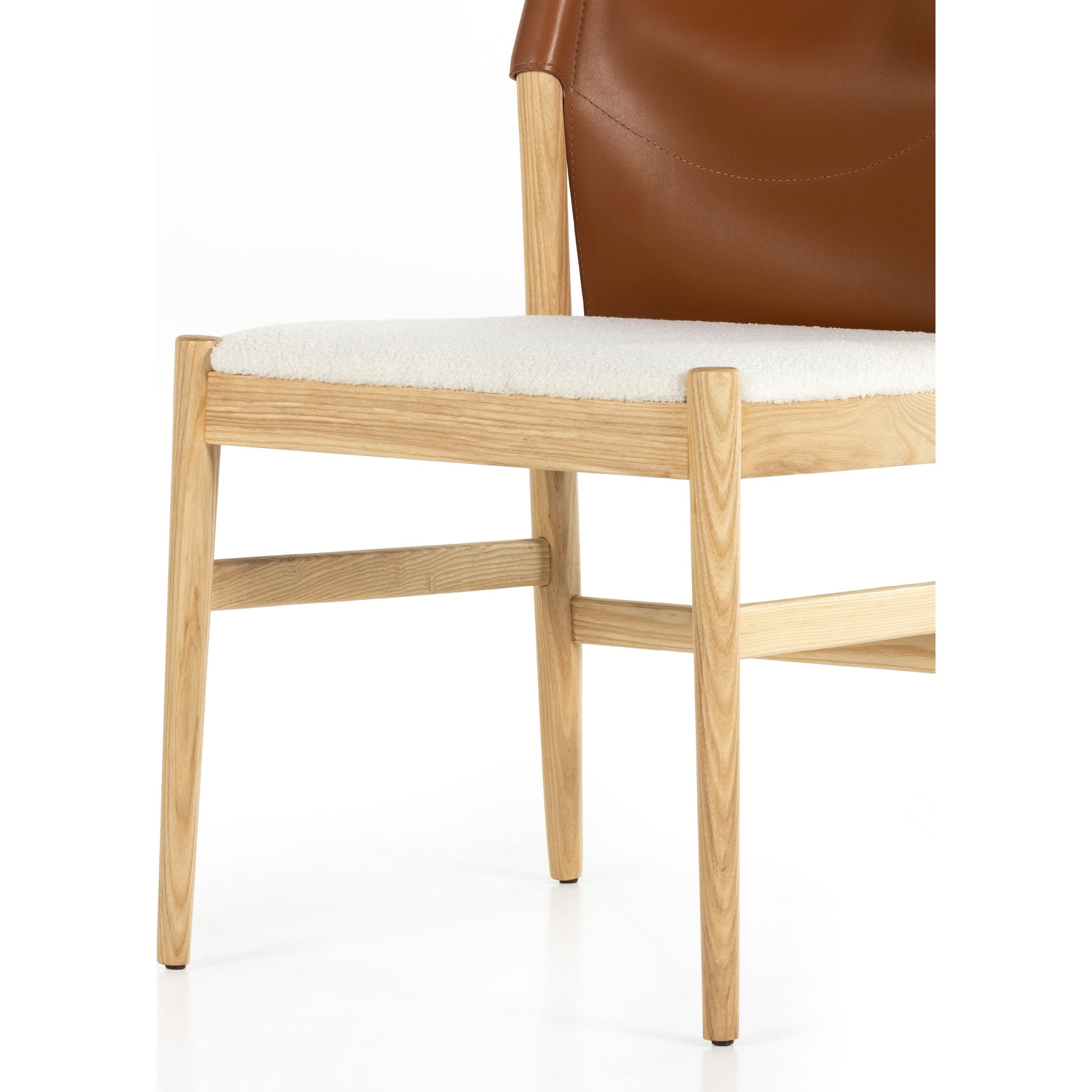 Lulu Armless Dining Chair by Four Hands in espresso leather, cardiff cream and umber ash. Made from 100% polyester, solid ash, 70% split leather, 30% polyvinyl chloride (pvc) in a modern style.
