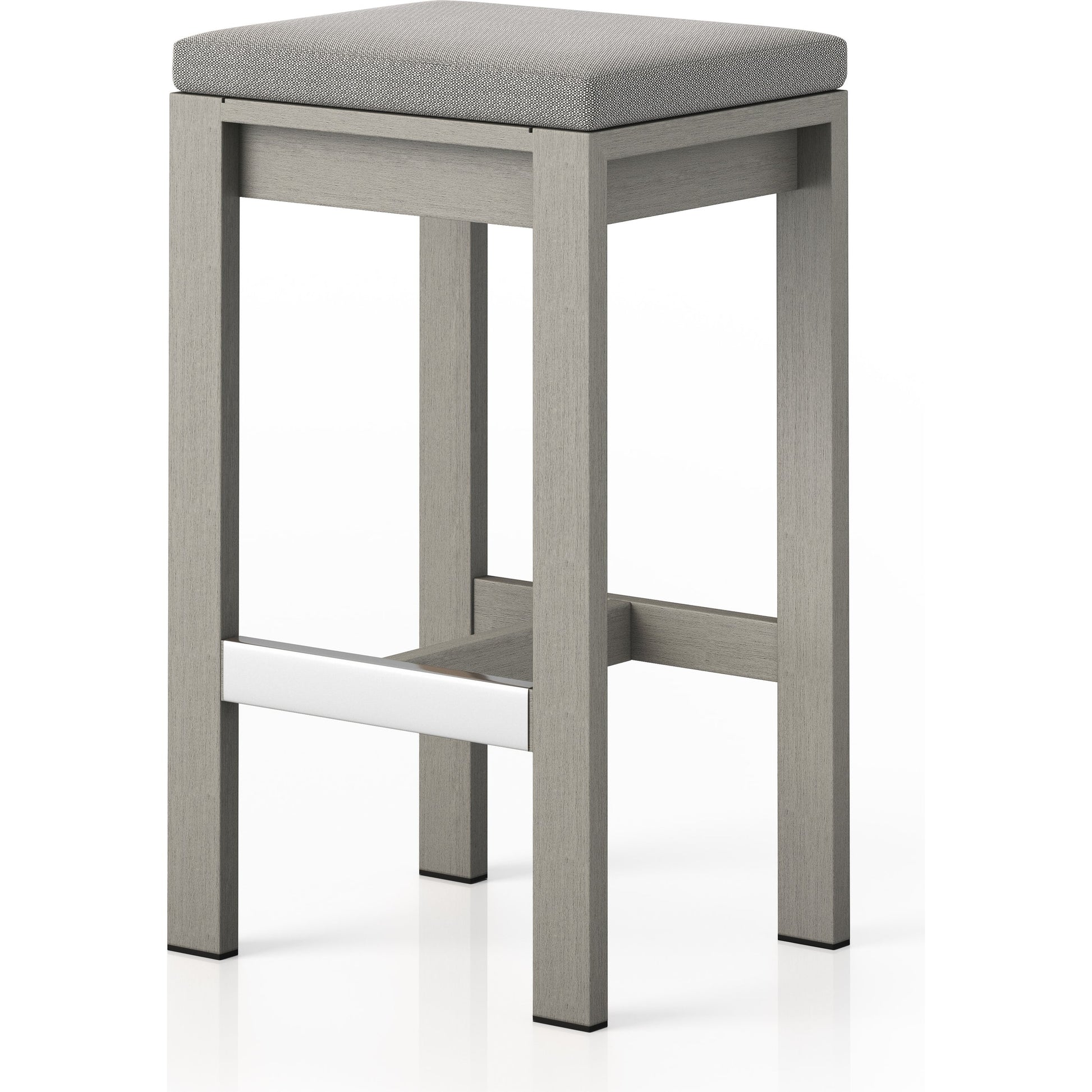 Monterey Bar Stool by Four Hands in faye navy and weathered grey. Made from 100% olefin, solid fsc®-certified teak, 91% polyurethane foam pad, 9% polyester fiber batting in a modern style.